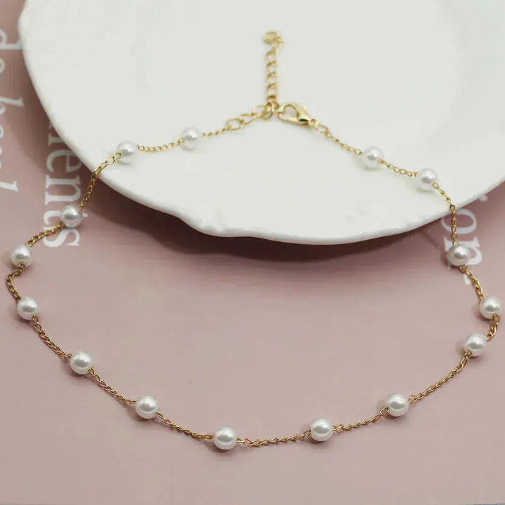 Colar de Pérolas em Dourado