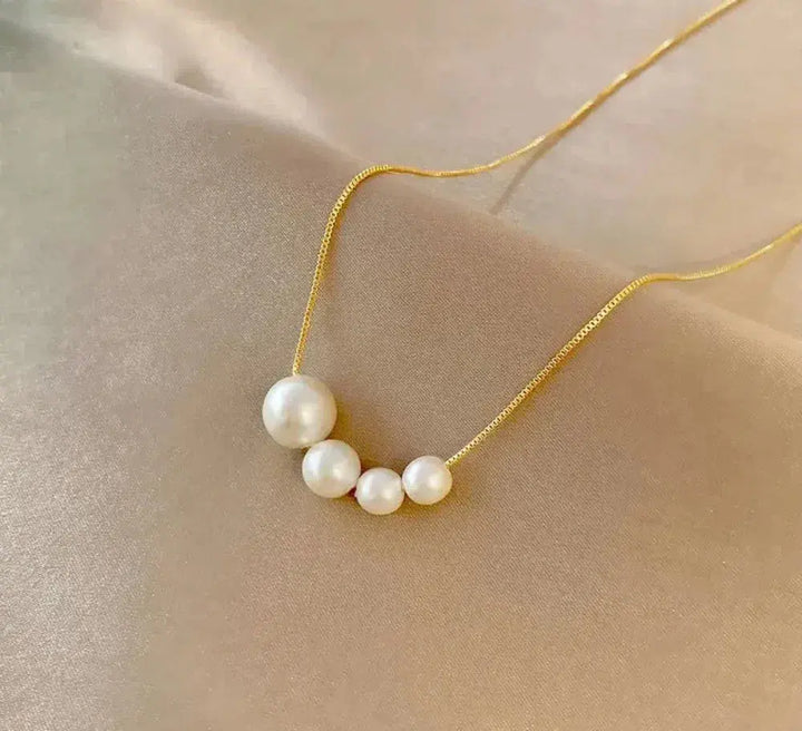 Colar de pérolas de água doce douradas