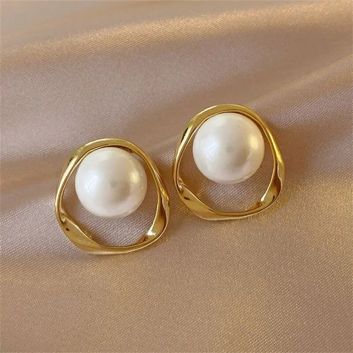 Brincos de pérolas em ouro